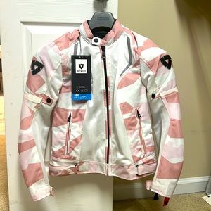 Brand new with tags ladies motorcycle jacket light pink camp.  Perfect condition